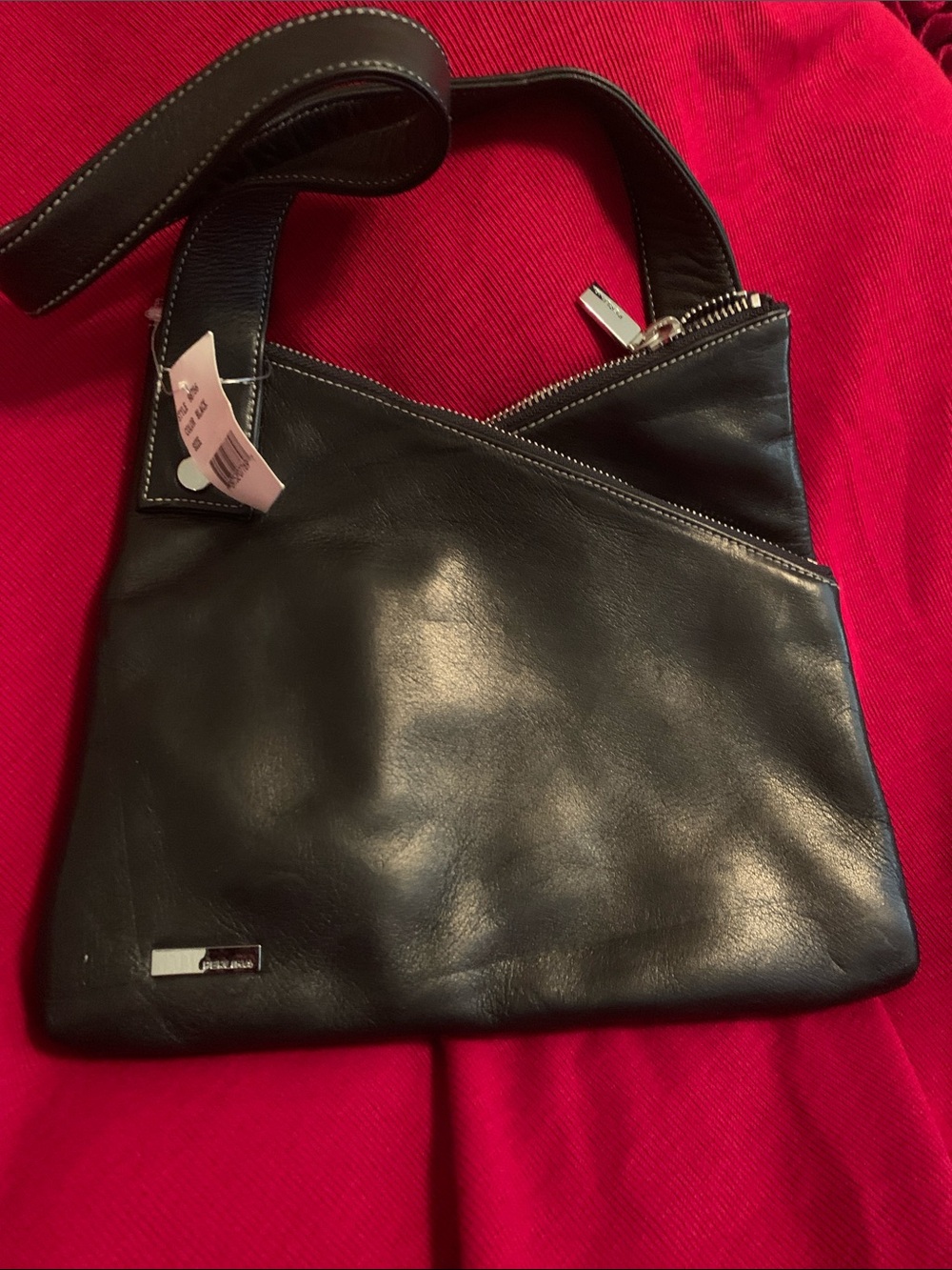 Perlina Black Leather Shoulder Bag with Diagonal Zip Detail